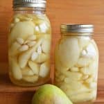 Home Canned Almond Pears - Light almond syrup and blanched almonds pair well with the natural sweetness of perfectly ripe pears.