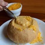 cheese soup in a bread bowl