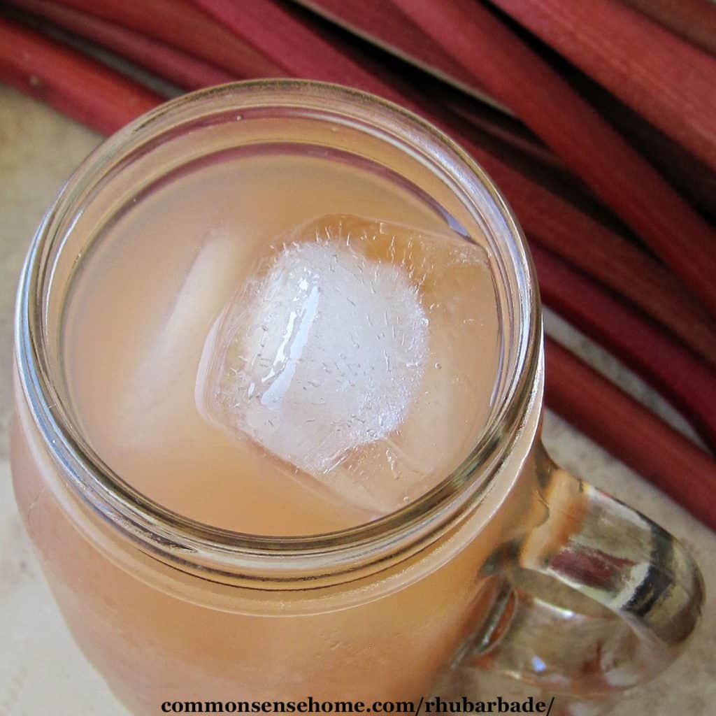 strawberry rhubarb lemonade drink in glass with ice