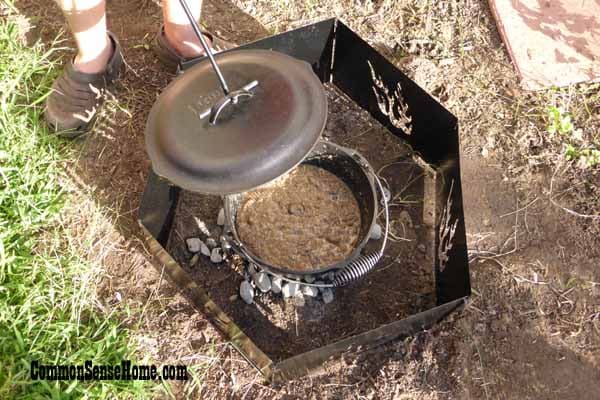 removing a hot Dutch oven lid with a lid lifter