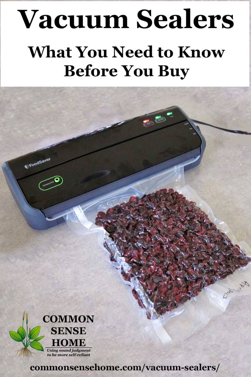 small, black FoodSaver Vacuum Sealer machine sealing a package of dried cranberries