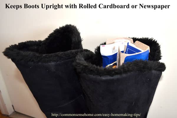 Boots kept upright with rolled cardboard