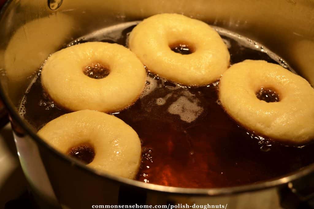 Frying homemade doughnuts