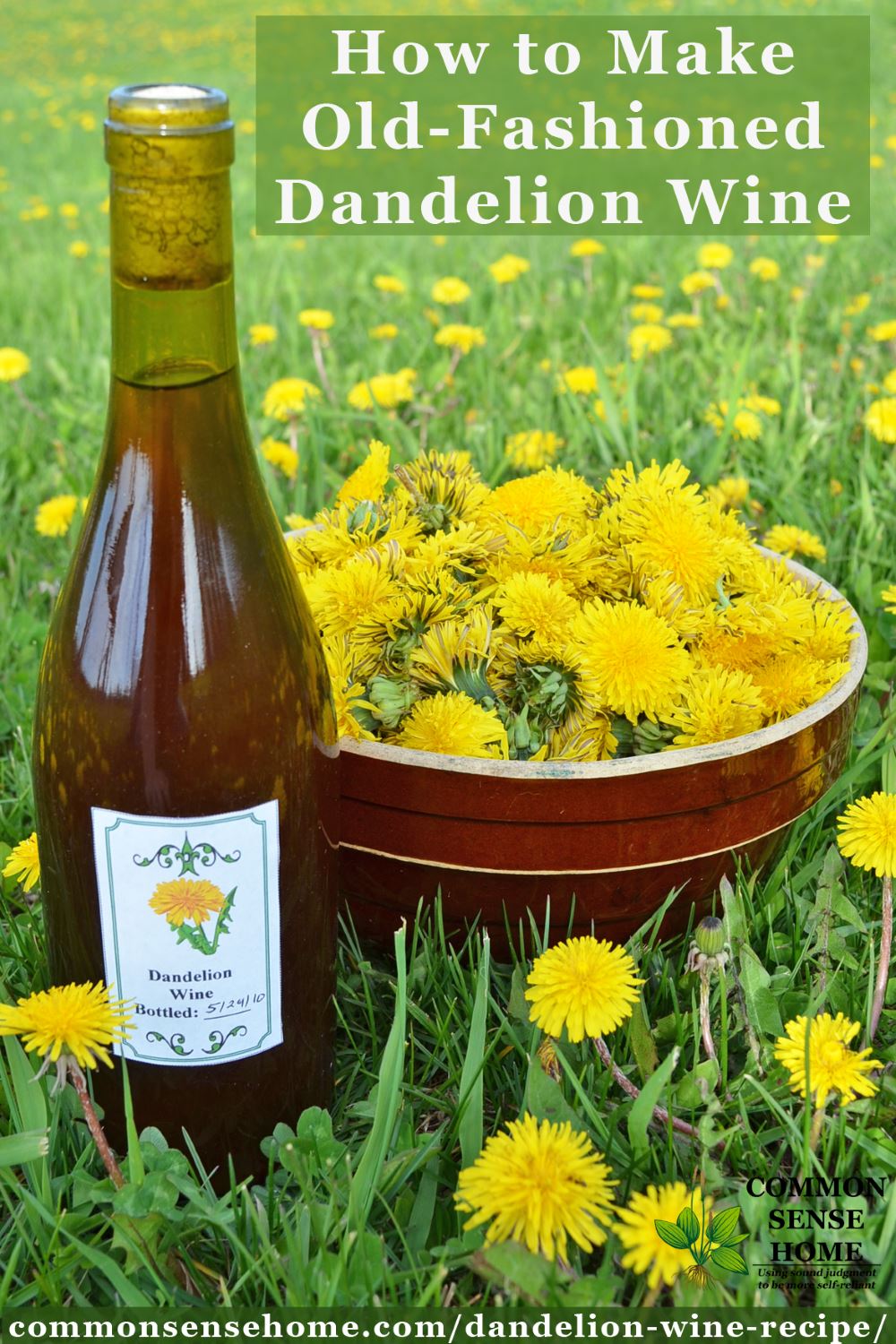 Bottle of homemade dandelion wine sitting next to a bowl of dandelion flowers