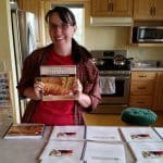 Laurie Neverman holding her bread book