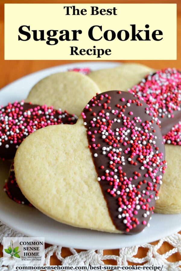 best sugar cookies cut in heart shape and covered in chocolate and sprinkles