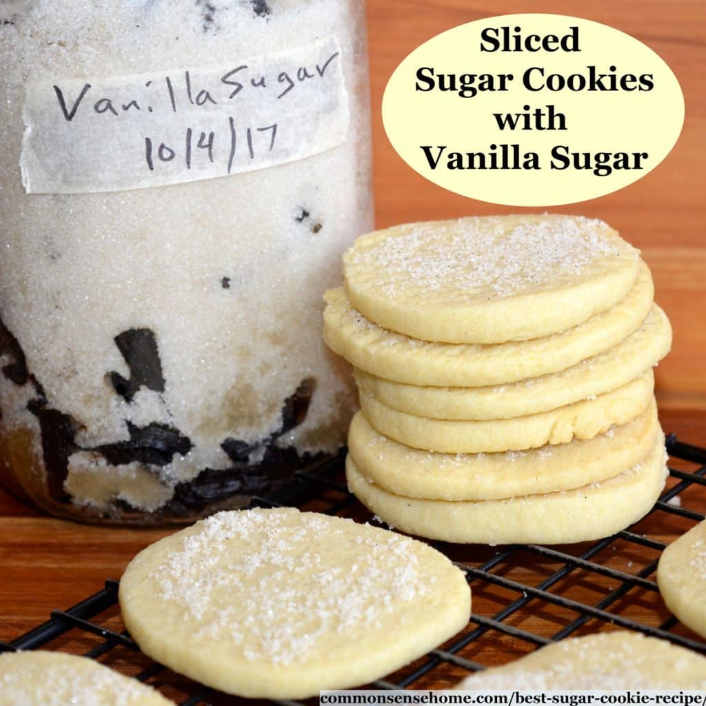 easy sugar cookies stacked next to a jar of vanilla sugar