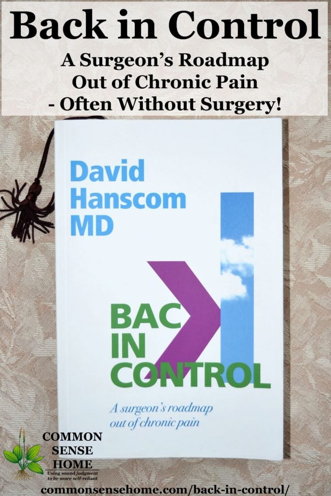 A copy of the book "Back in Control" laying on a table