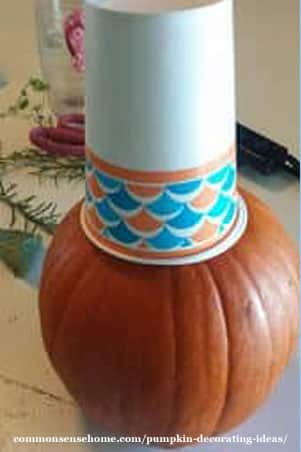 Fun and easy pumpkin decorating ideas with fresh pumpkins, flowers and herbs from your garden, common pantry and craft items to brighten any room.