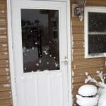 snow covered door