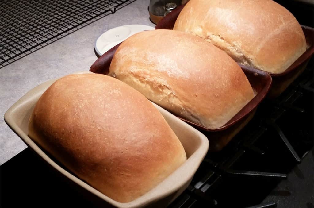 three loaves of homemade bread