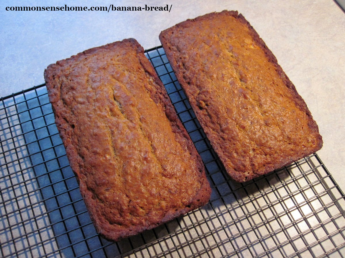 two loaves of banana bread on wire rack