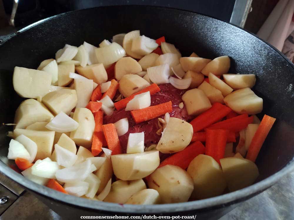 meat and vegetables in Dutch oven