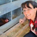 Laurie Neverman with chickens