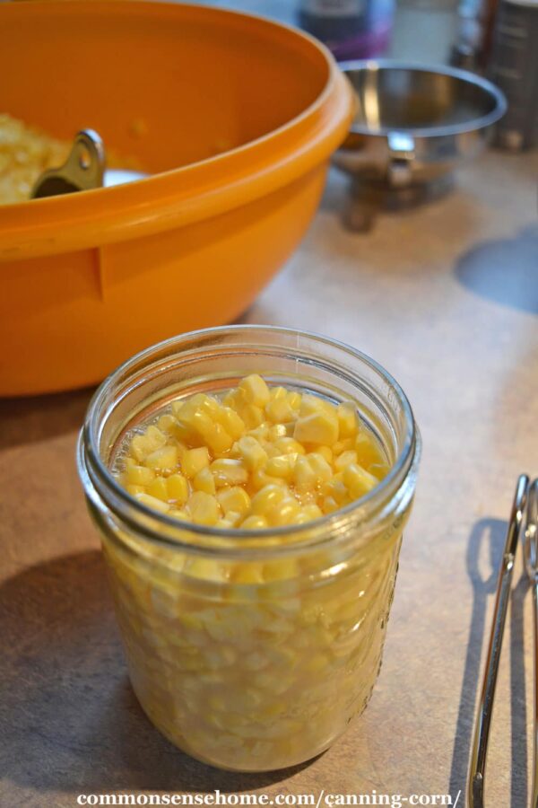 jar full of sweet corn with one inch headspace