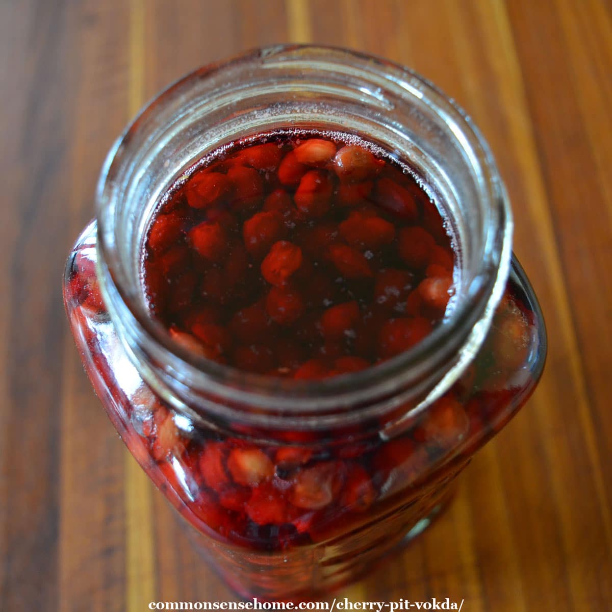 pits in jar covered with vodka