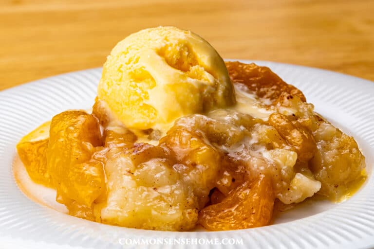 old fashioned peach cobbler with ice cream