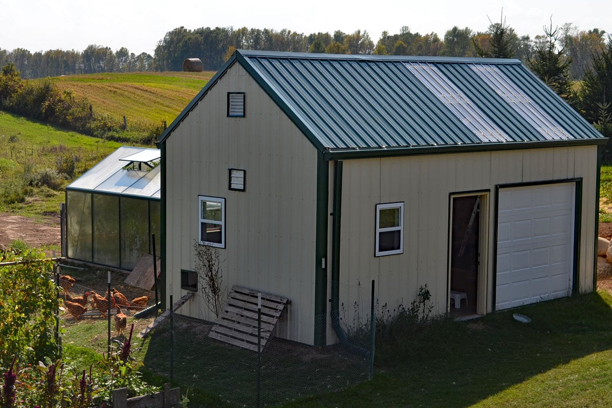 combination chicken coop, garden shed, and greenhouse