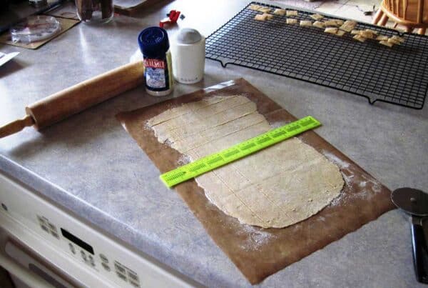 rolling out homemade crackers