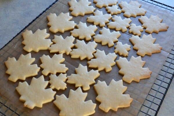 maple leaf shaped cookies on cooling rack