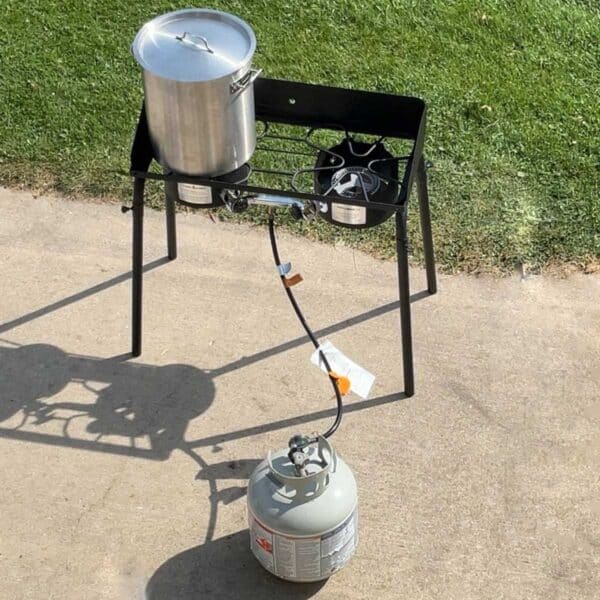 rendering outside on a propane burner