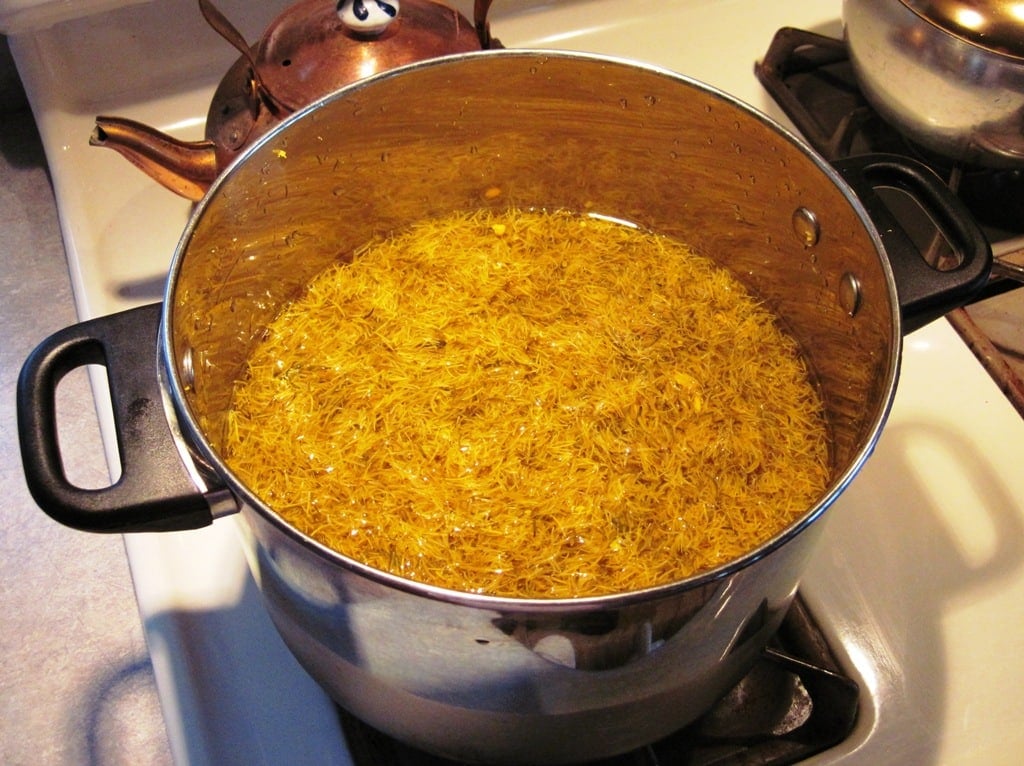 dandelion petal tea on stove