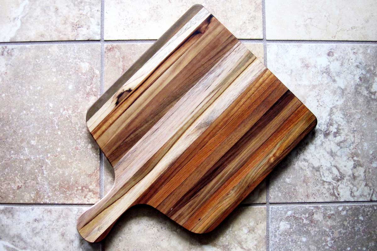wooden cutting board with handle