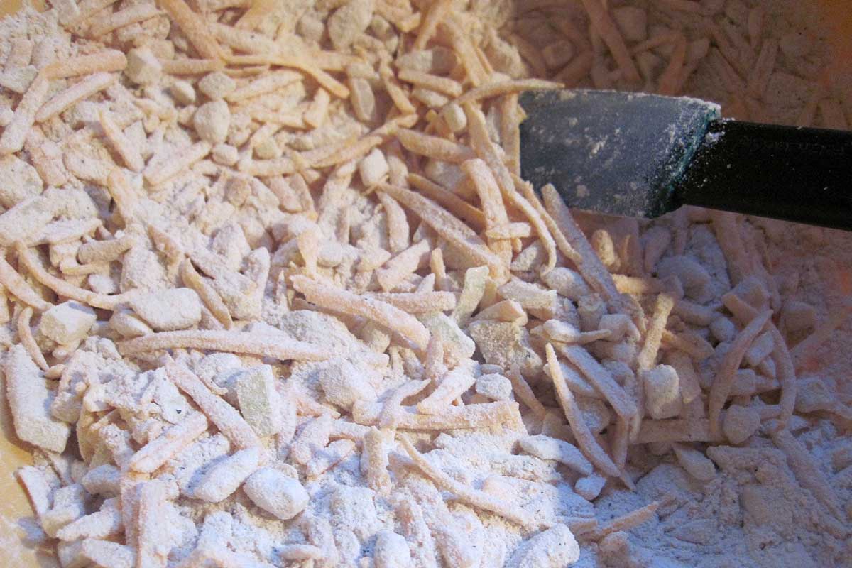 dry ingredients. zucchini, cheese, and onion