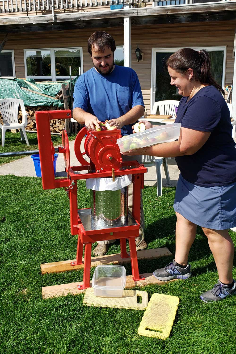 making apple cider with a cider press