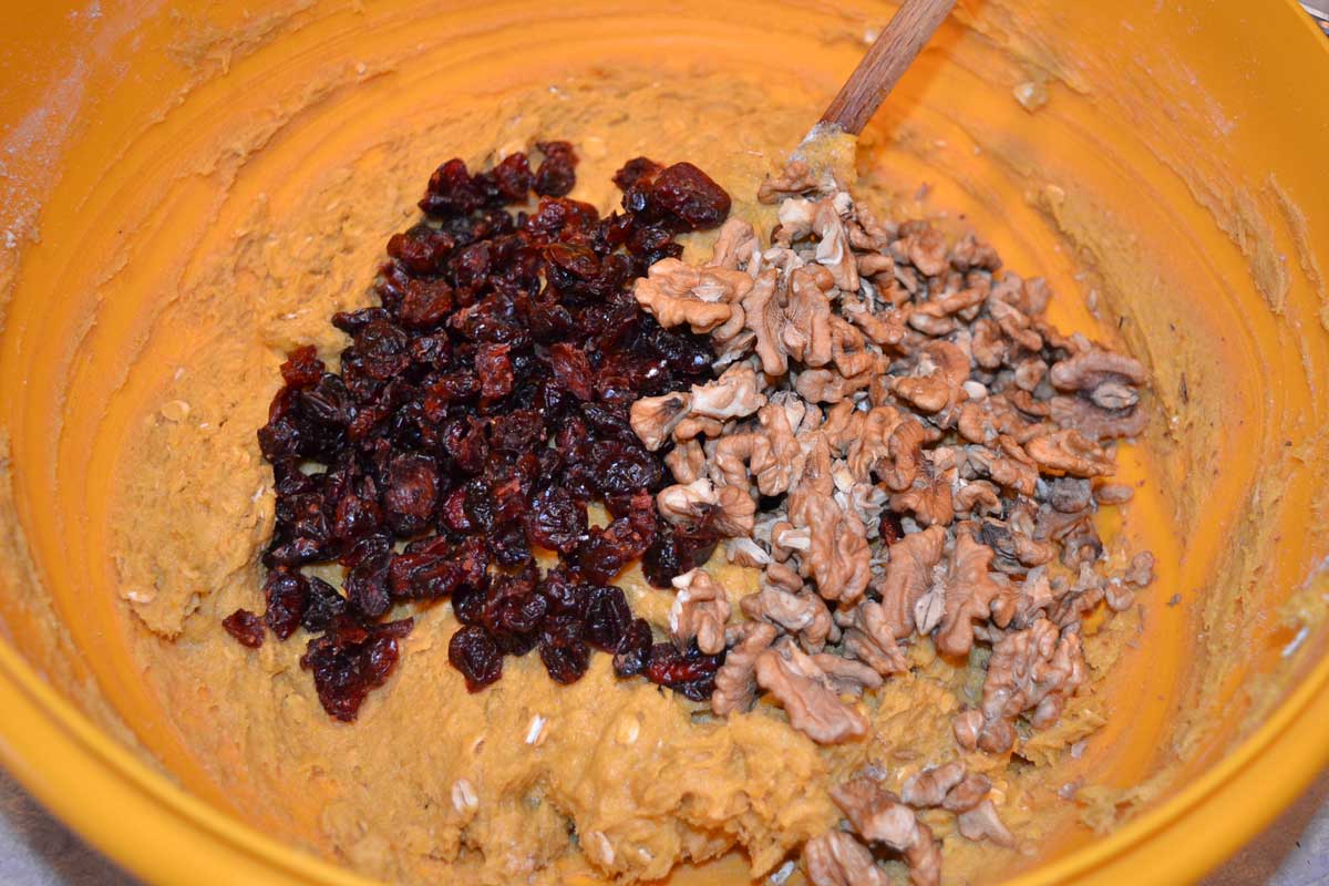 adding cranberries and walnuts