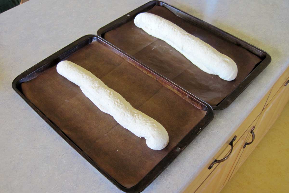unbaked French bread loaves