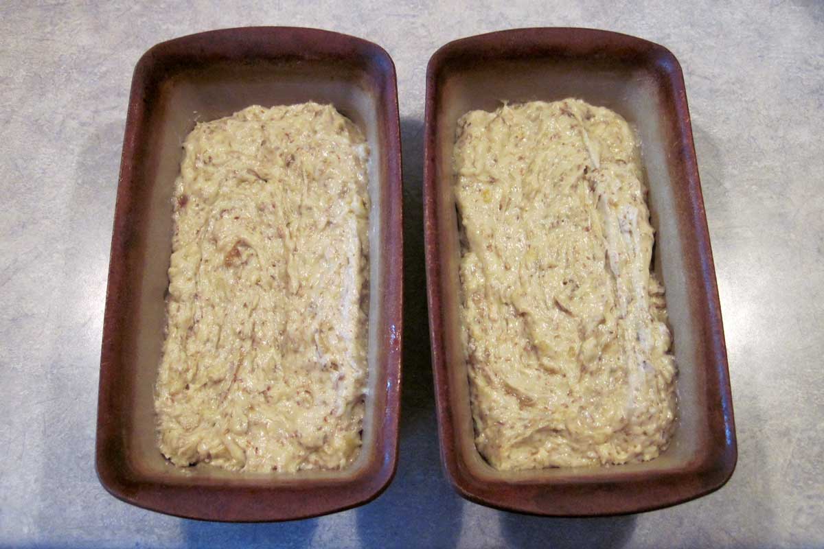 banana bread batter in pans