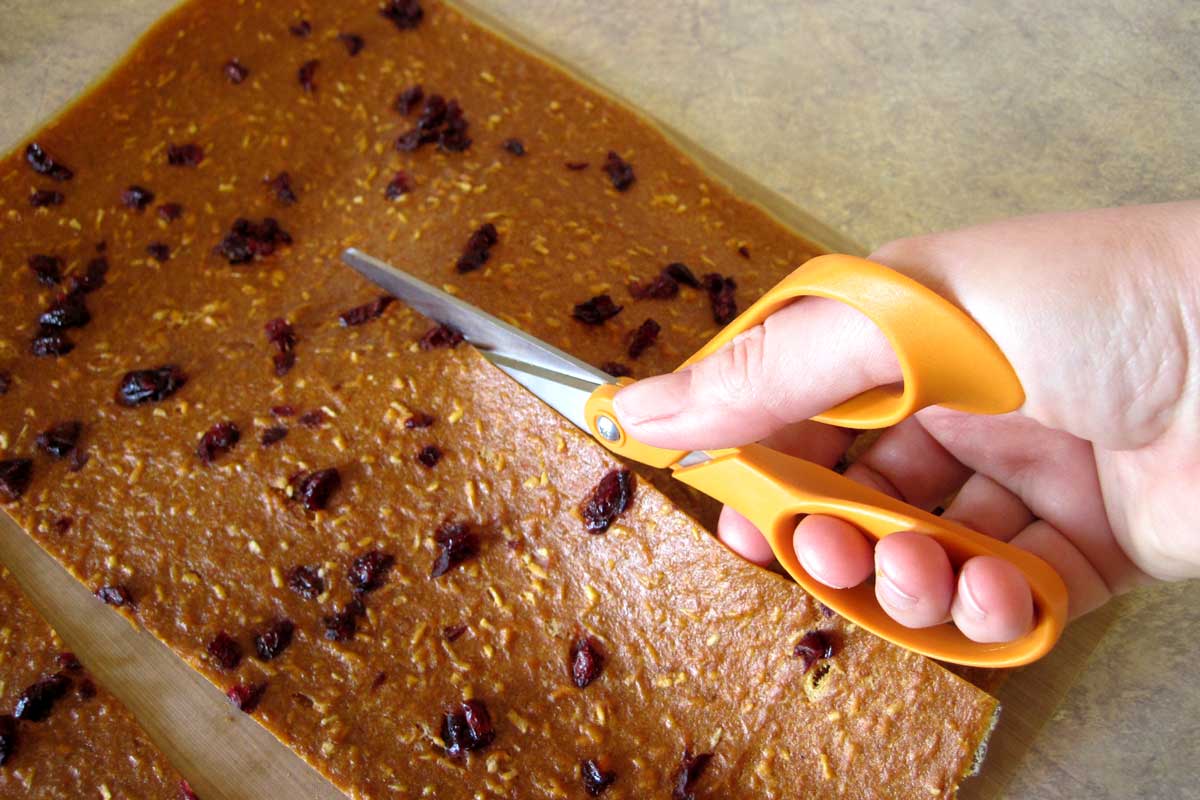 cutting pumpkin leather with scissors