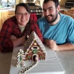 Laurie and Duncan with their gingerbread house