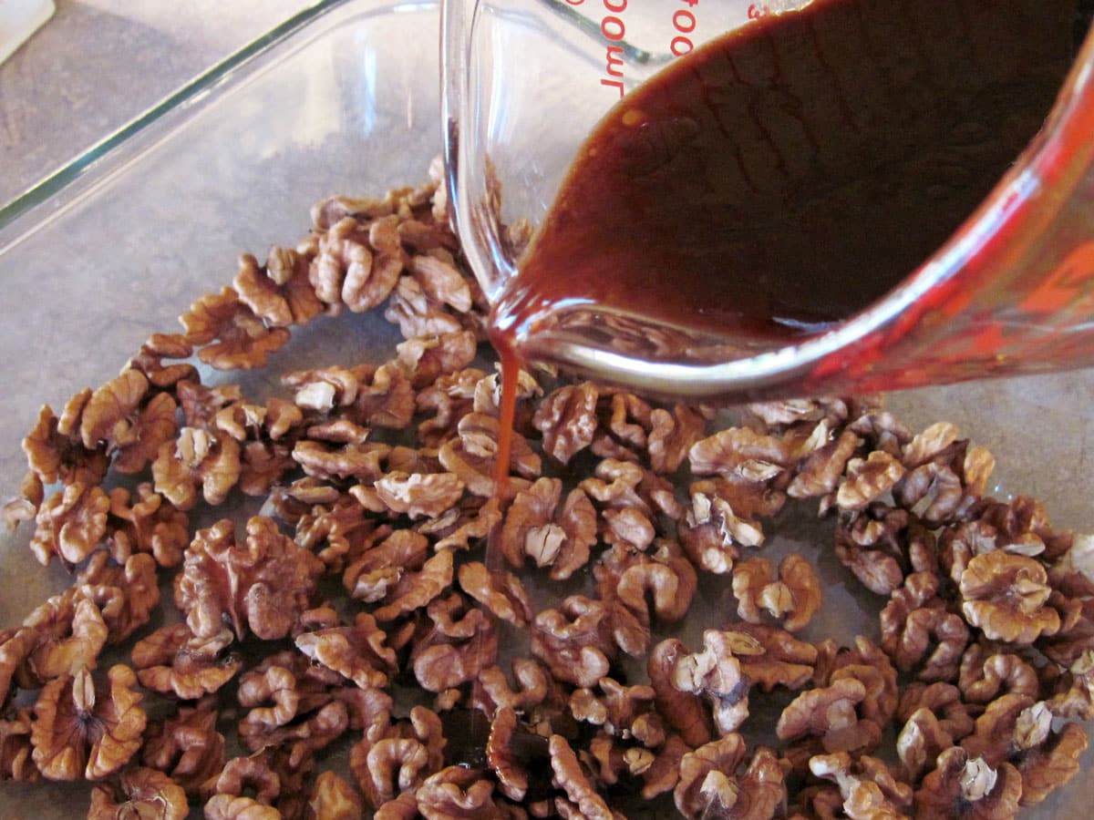 raw walnuts in baking pan